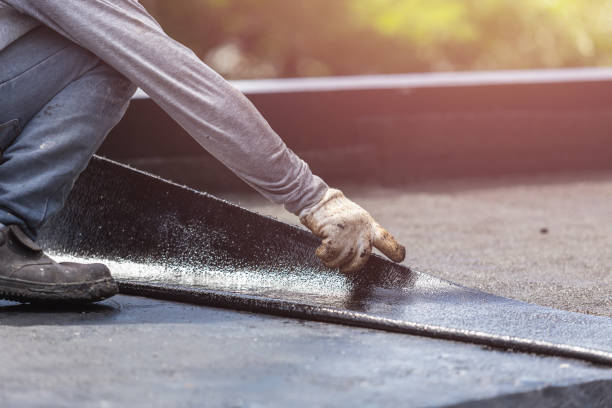 Professional Waterproofing technician working in Green Valley, WI